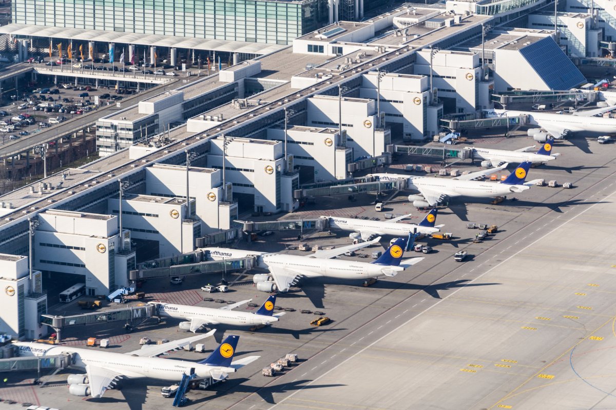 an aerial view of airplanes parked at an airport