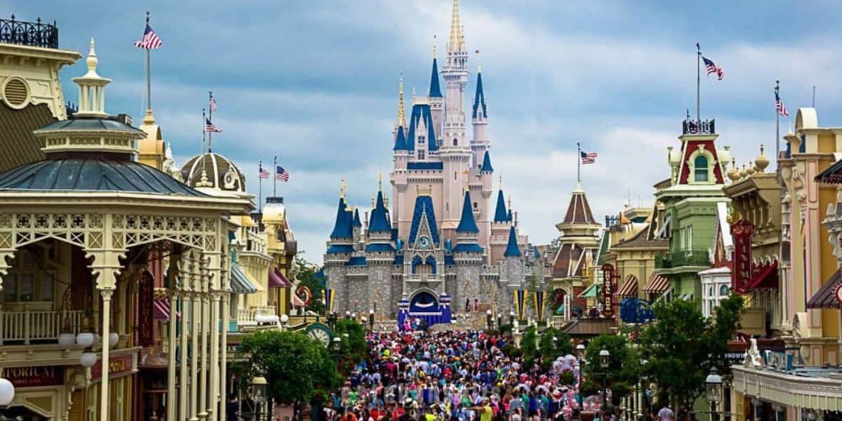A look at crowds headed to Cinderella Castle from Main Street, USA at Magic Kingdom Park