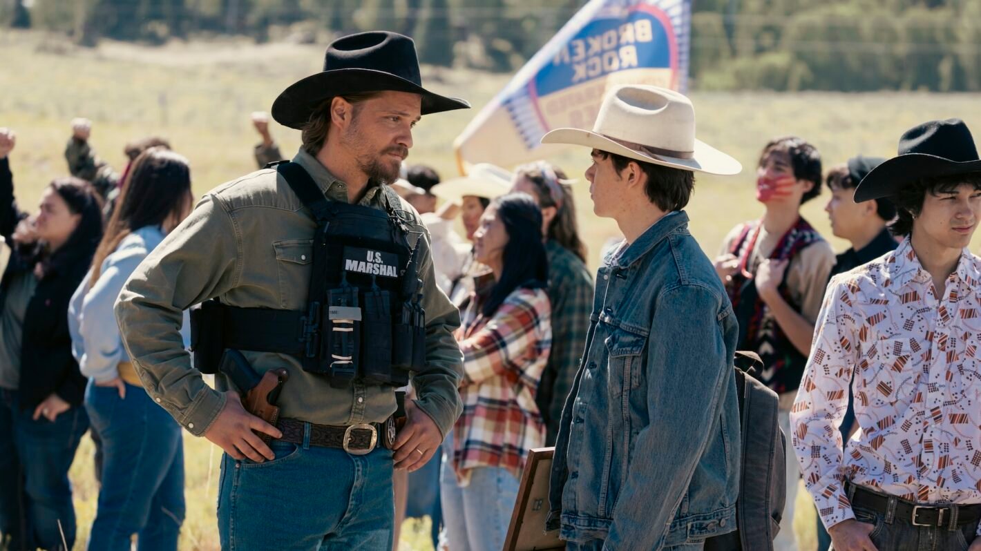 Luke Grimes as Kayce Dutton and Brecken Merrill as Tate Dutton —