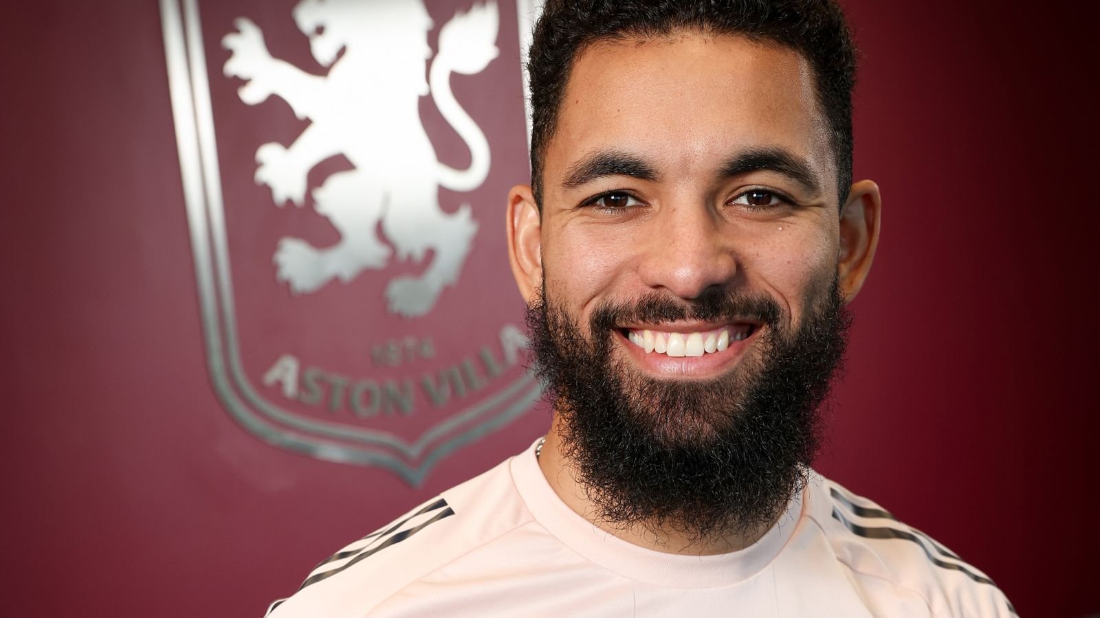 Douglas Luiz of Aston Villa poses for a picture at Bodymoor Heath training ground on January 28, 2026